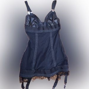 Black dress with lace on bottom and elastic on the bottom.